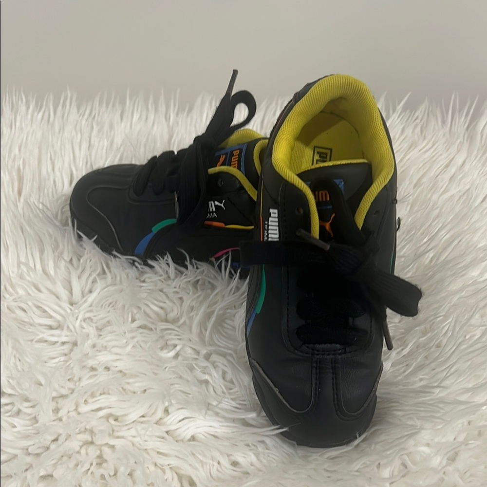 Puma Black and Yellow Sneakers with Modern Design